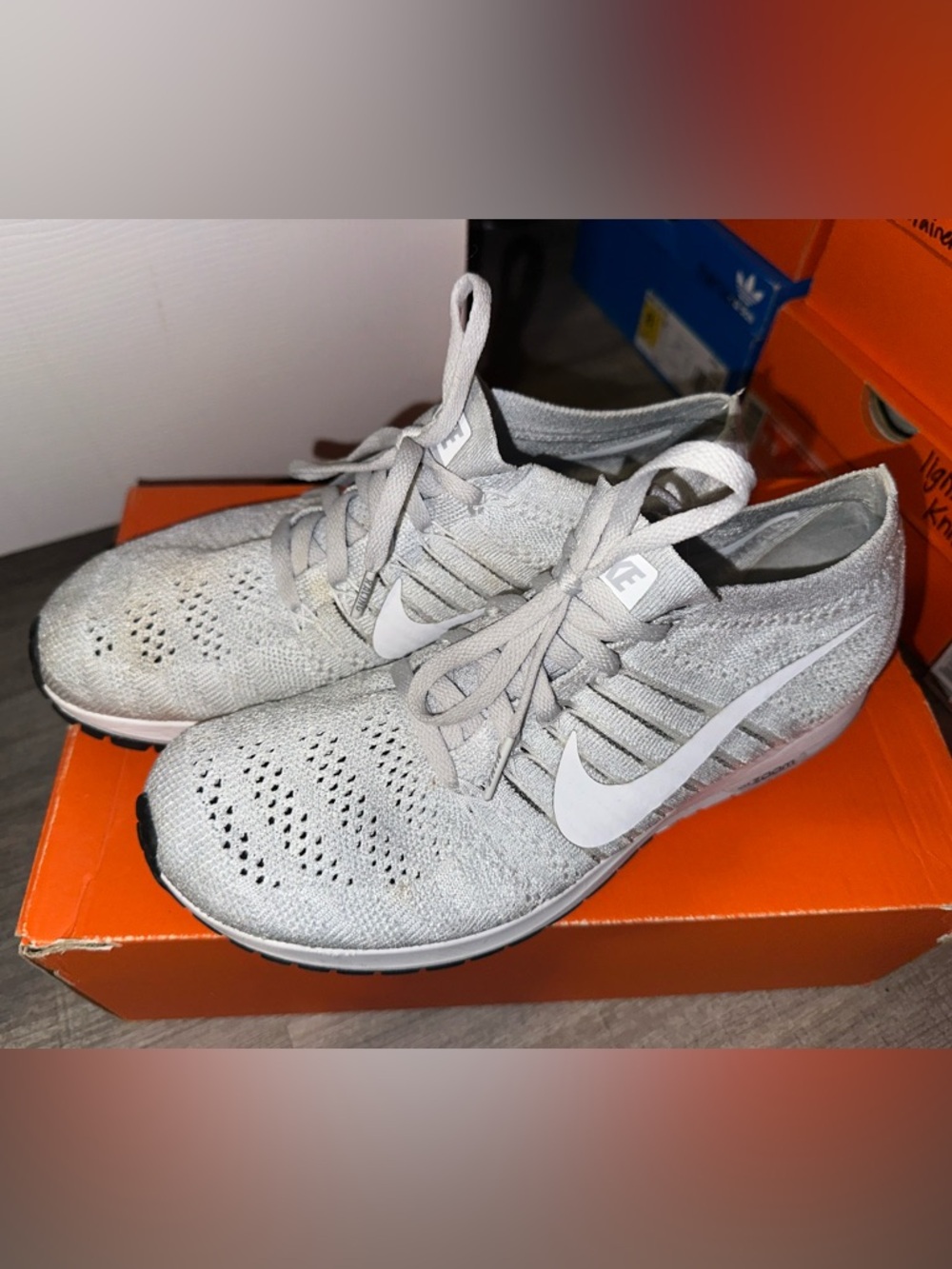 Nike Light Gray Flyknit Athletic Sneakers